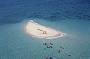 Snorkel and swim off the clear shallow waters of the Cay
