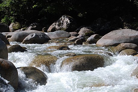 Mossman river flowing over granite boulders