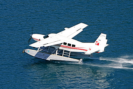 Experience a seaplane landing on the ocean