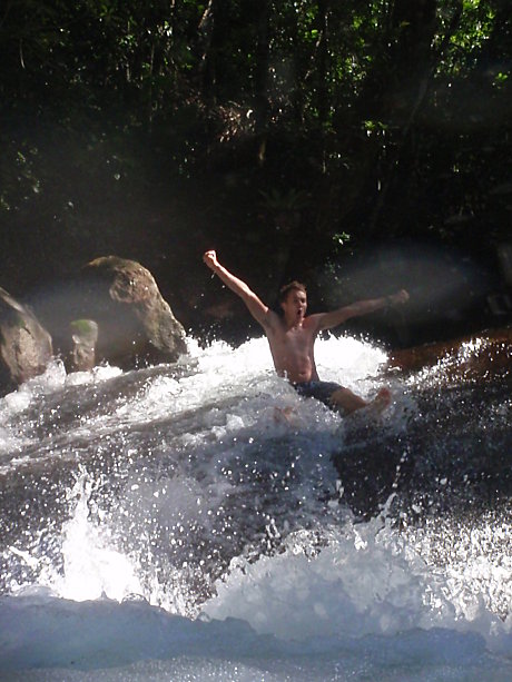 Slide down a natural water slide at Josephine Falls!