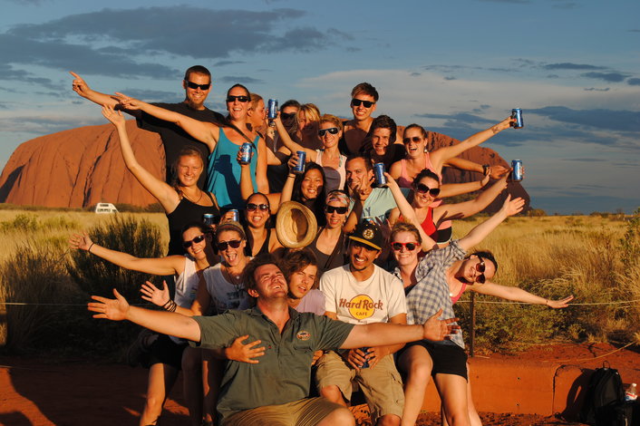 Happy Campers enjoying Uluru Sunset with the tour guide