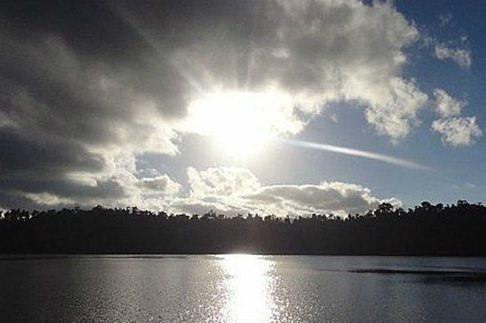 Afternoon sun over Lake Eacham