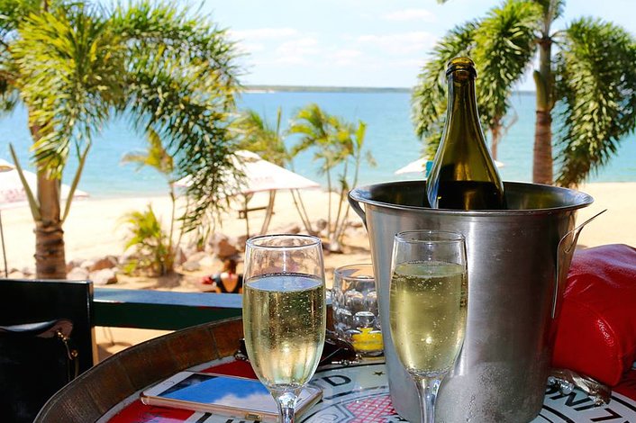 Champagne overlooking the beach at Crab Claw Island resort