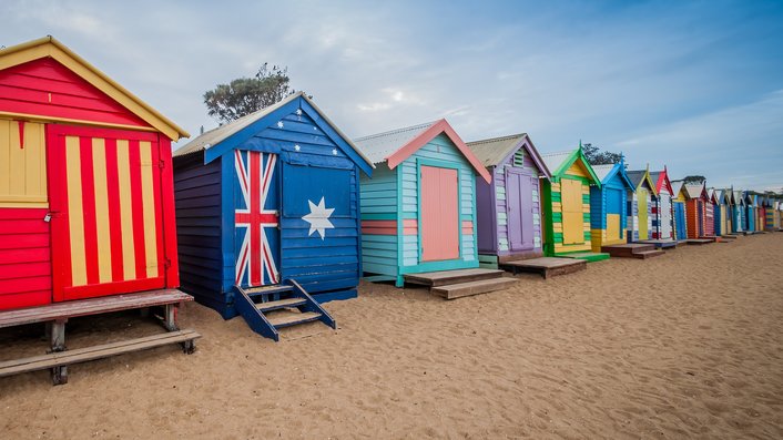 Photograph the colourful beach huts at Brighton Beach