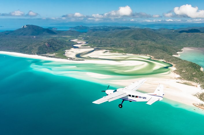 Fly over Hill Inlet and Whitehaven Beach!