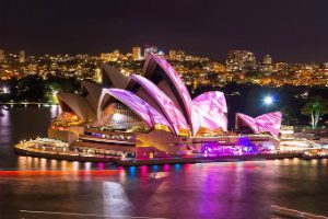 Sydney Opera House with pink light painting her sails