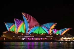 Different coloured lights on the sails of Sydney Harbour bridge VIVID