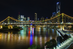 Coloured light on the Brisbane River near the Storey bridge