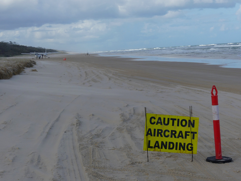 Airstrip on 75 Mile Beach Fraser Island Aircraft landing sign on the highway