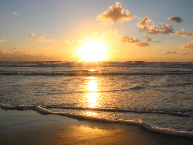 Sunrise on Fraser Island Standing on the beach watching the sunrise over the ocean
