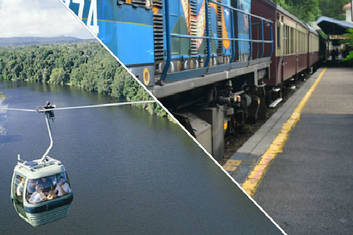 Skyrail over Barron river and Kuranda Scenic railway at Kuranda