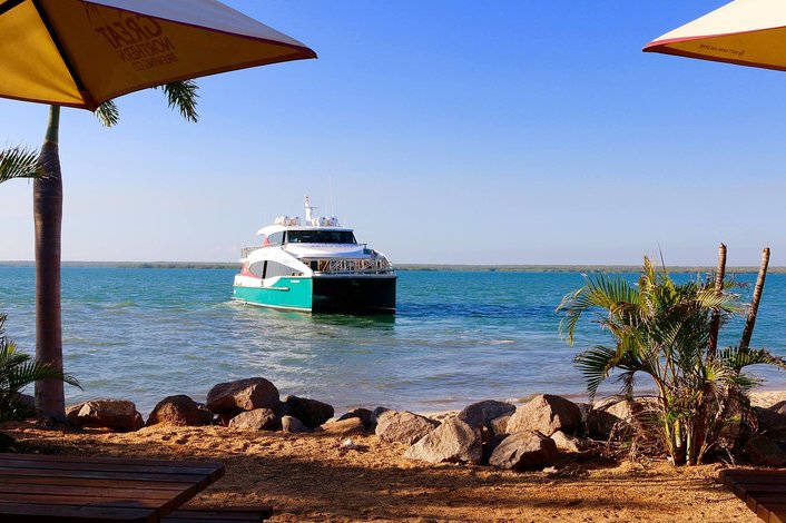 The ferry arriving at Crab Claw Island resort