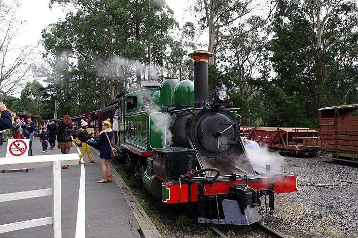 Taking your photo with the driver of Puffing Bill