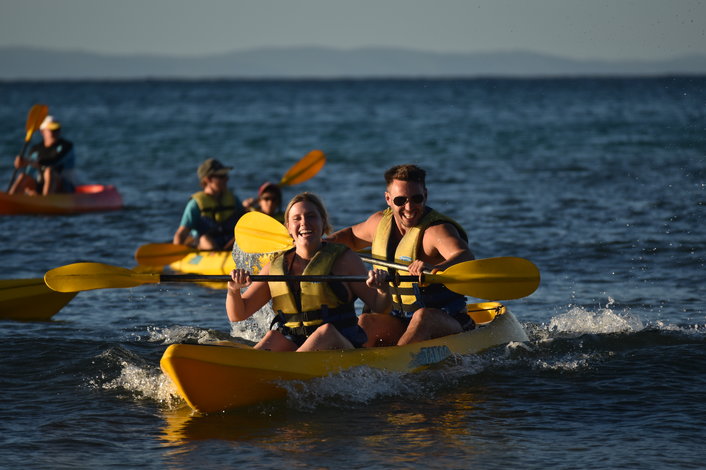 Lets catch some super long waves on kayaks