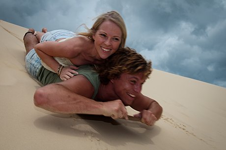 Sandboarding in the Desert sand dunes
