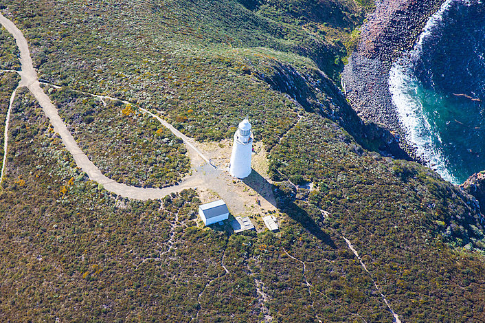 The Cape Bruny Lighthouse on the sea cliff coastline