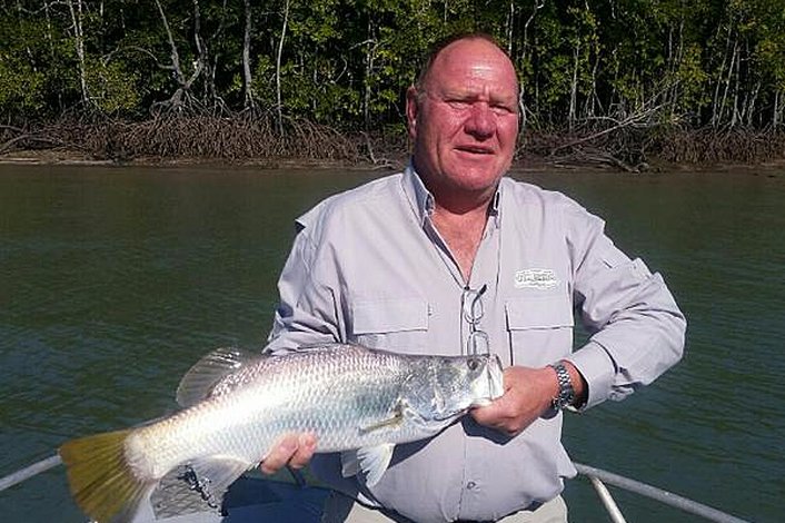 Ian and his 63 cm Barramundi while estuary fishing