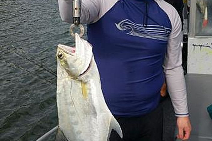 Tom and his #2 Queenfish while estuary fishing