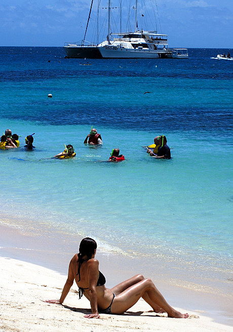 Relaxing on Michaelmas Cay's beach