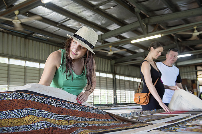 Checking out the renowned Tiwi paintings