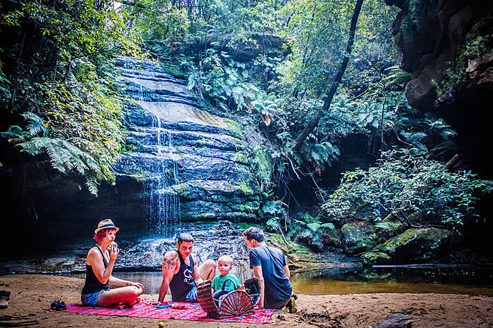 Serene waterfall picnic