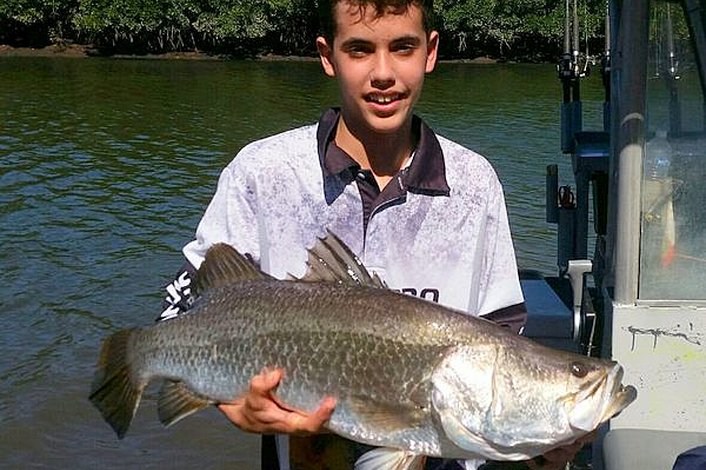 Xaviar and 88 cm Barramundi while estuary fishing